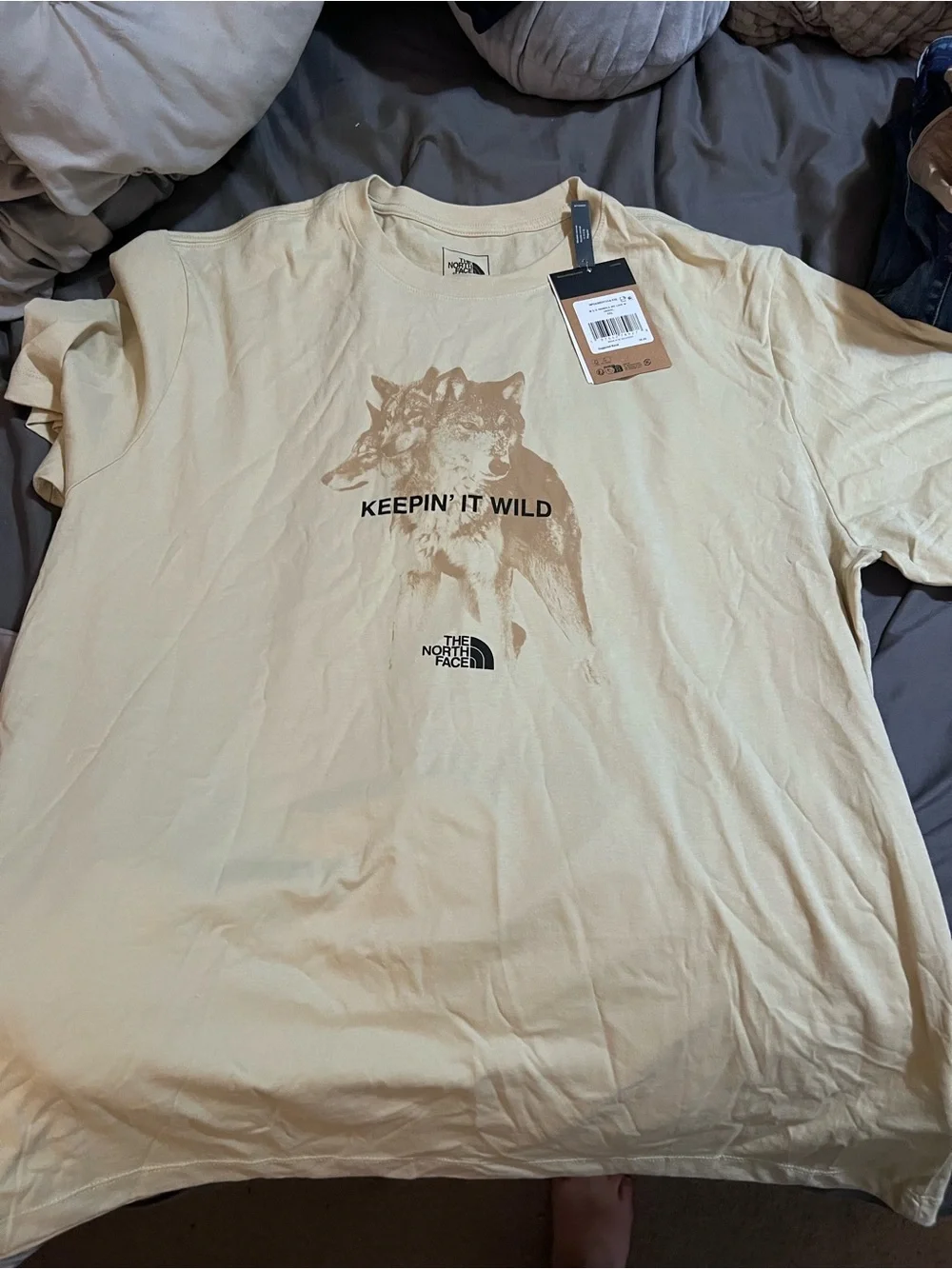 The North Face Men’s Pale Yellow 'Keepin' It Wild' Wolf Graphic Tee